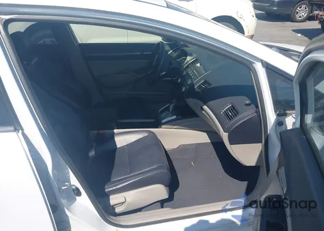 2010 Honda Civic Hybrid from USA, damaged, VIN JHMFA3F29AS005641